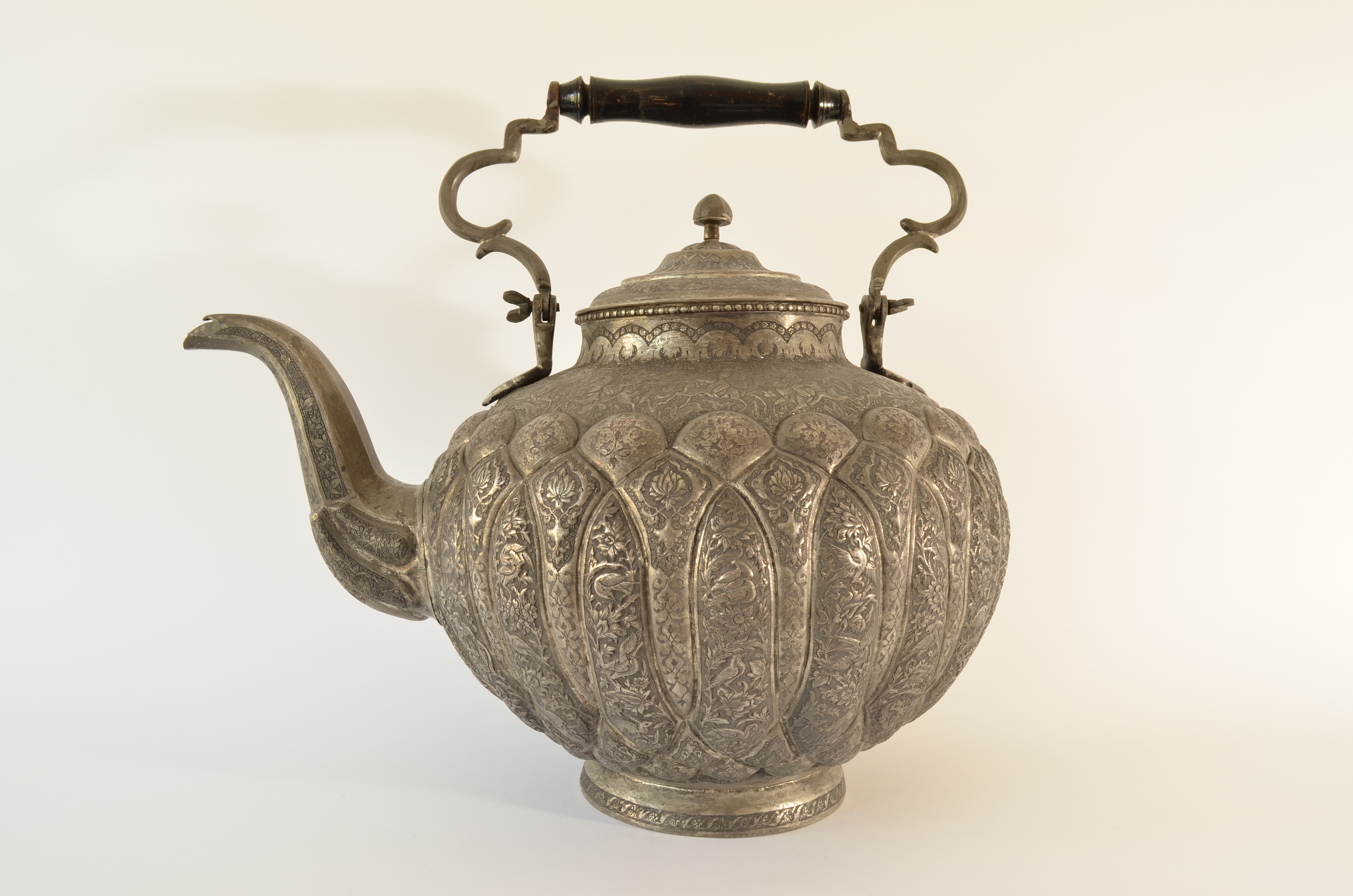 Large teapot, waterpot with neat engraved hunting scenes. Persia. Tinned copper. Neat engraved hunting scenes. 19th century. Iran – Isfahan. Hallmarked and monogrammed on the bottom.