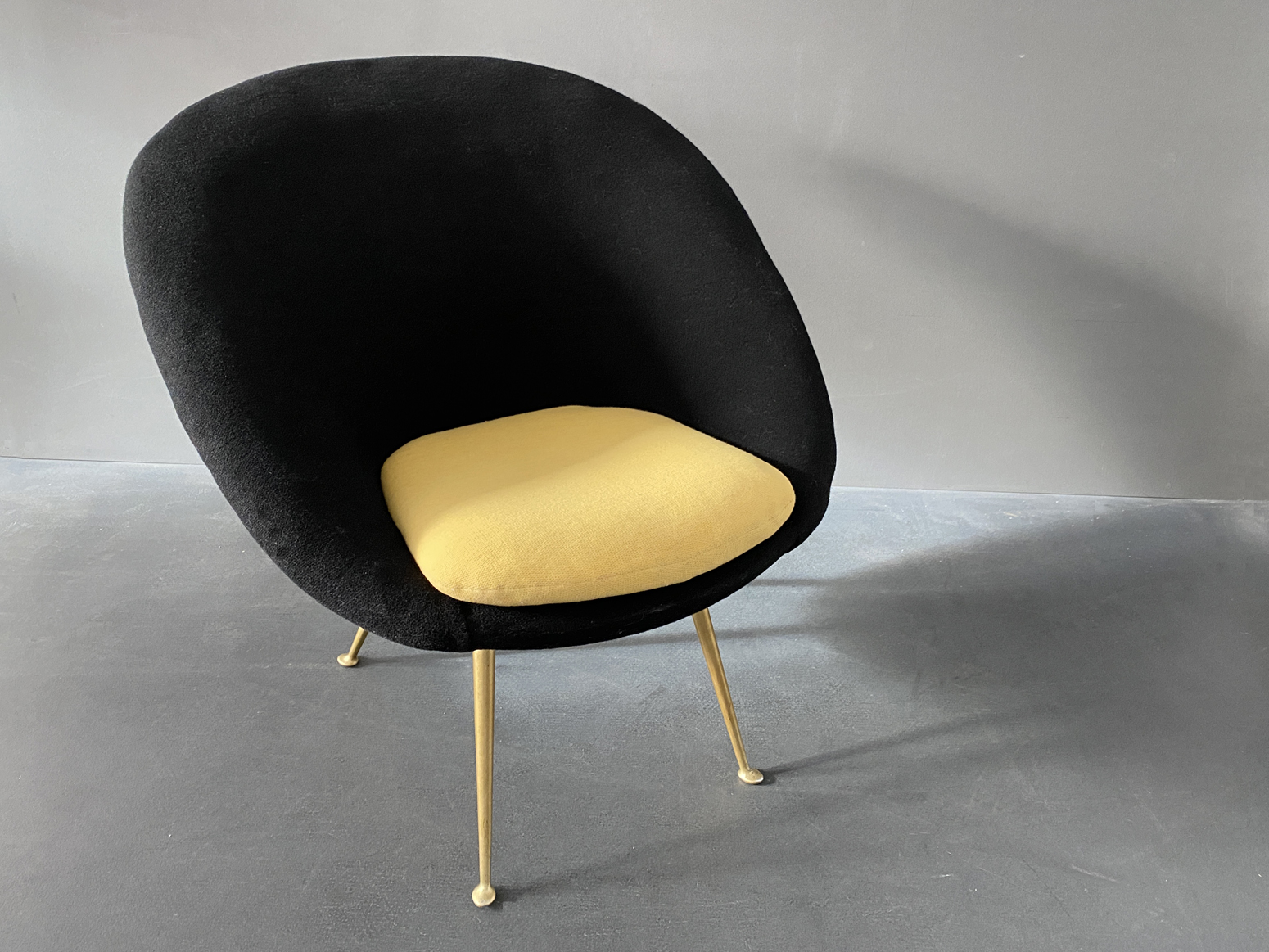 Cocktail Chair Easy Chair, upholstered in black and golden yellow, Italy 1950ies.
