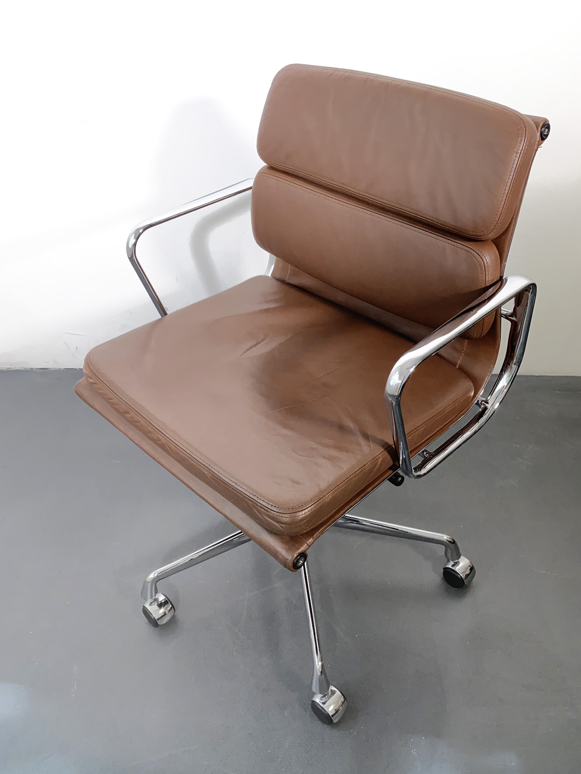 “SOLD” Mid Century Eames Swivel Chair EA 217 Soft Pad, brown, Vitra, Germany, 1970s.