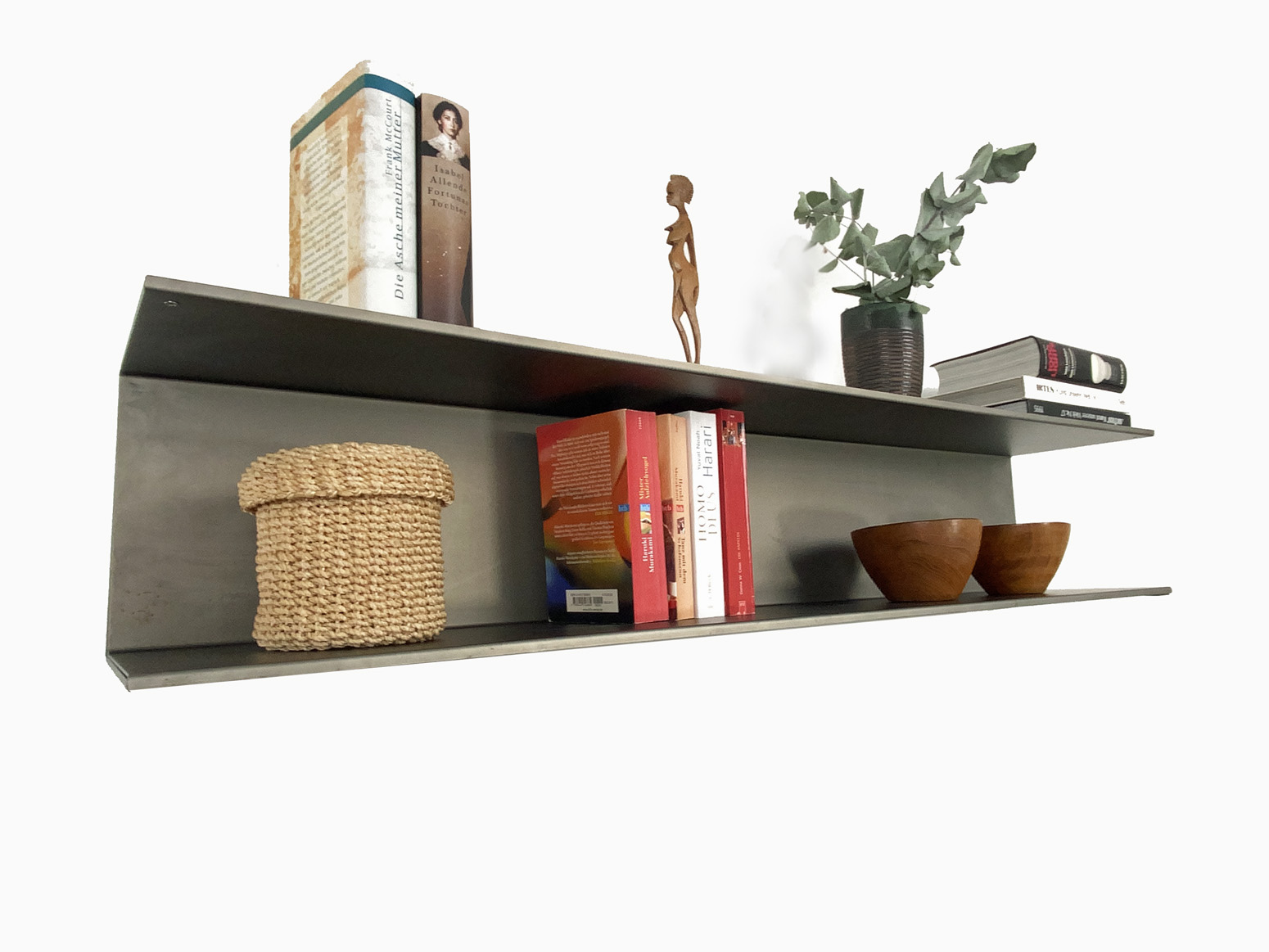 Bookshelf / Wall shelf for by Inga Reichert, made of black untreated crude steel – Industrial Design.