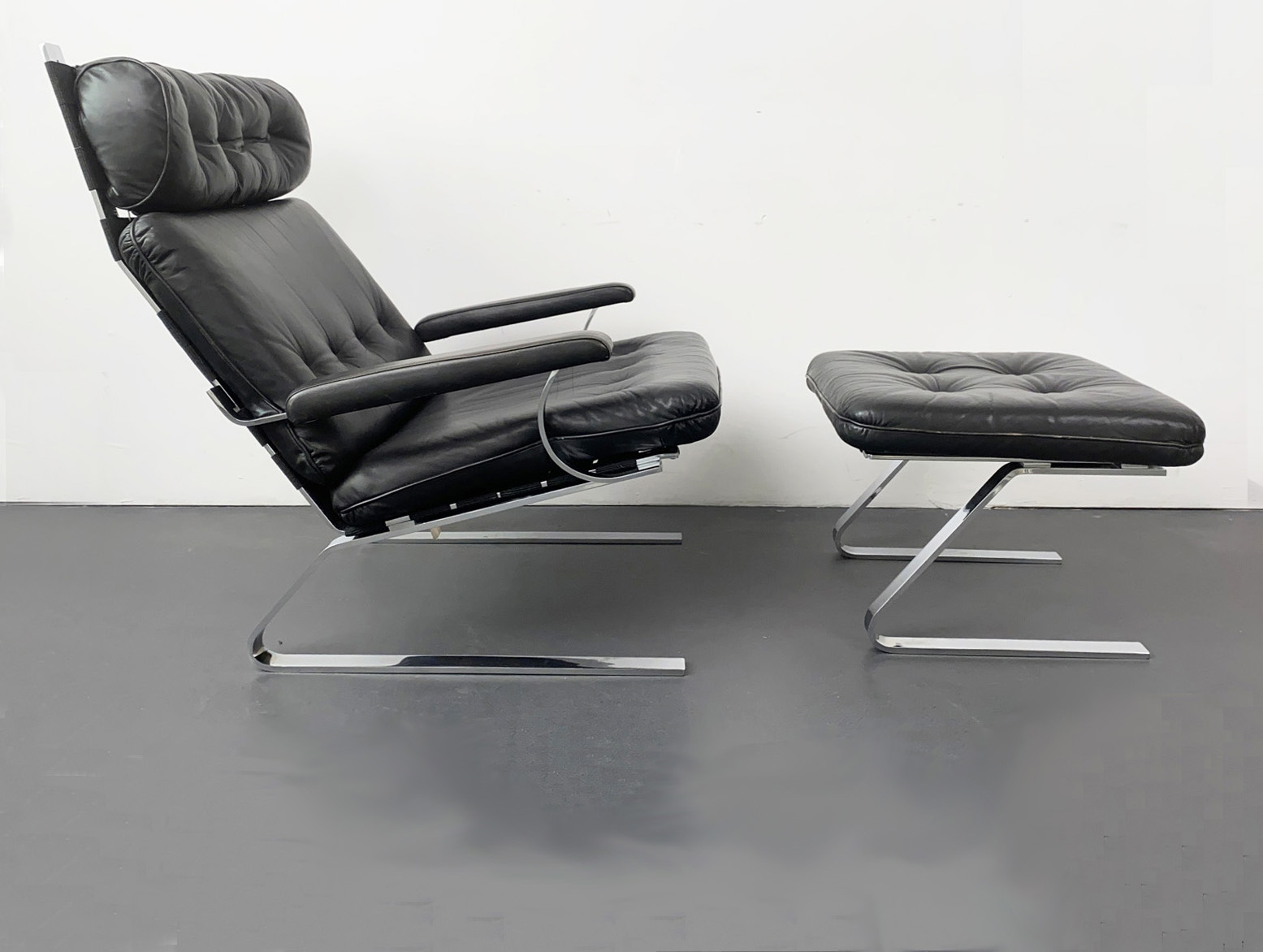 Lounge Arm Chair with Ottoman, black Leather, Chrome Frame, Germany, 60s.