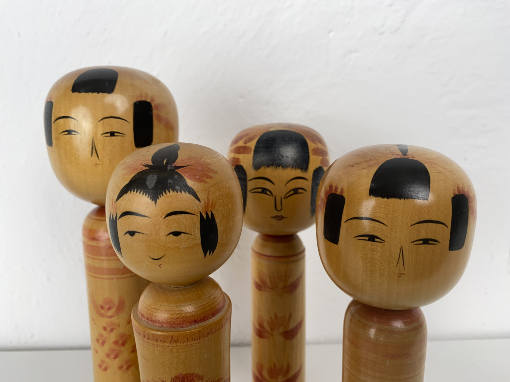 Set of 4 Kokeshi Wooden Dolls, painted, Japan, 1950s