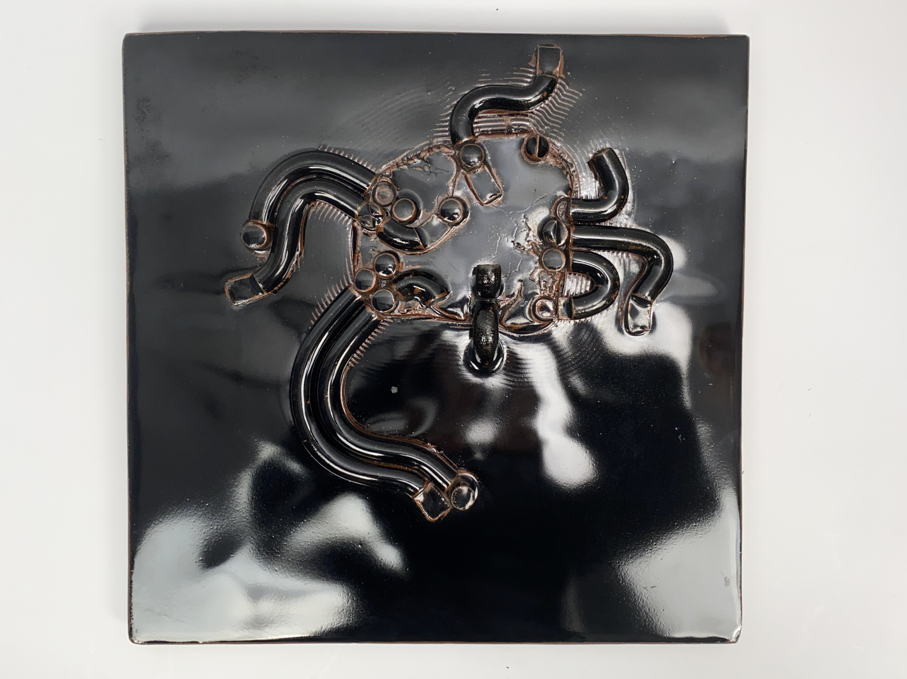 Relief Plate, Object, Ceramic, Stoneware, Unique Piece, assembled from formed Parts, black Iron Glaze, by Wilhelm & Elly Kuch, 1974