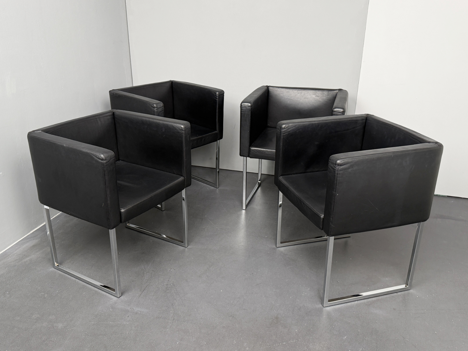 Set of 4 Cubica Armchairs in black Leather by Tito Agnoli for Zanotta, Italy, 2010s